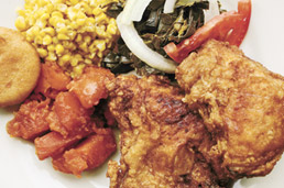 Mississippi Belle's Fried Chicken, fried corn, sweet potatoes and greens with bisket.