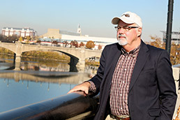 John Goss, Indiana's "carp czar," next to the White River