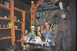 Kids enjoy â€˜Wicked Workshopâ€™ during IPL-sponsored lights-on hour at The Childrenâ€™s Museum.