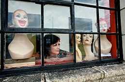 owner in her vintage clothing store