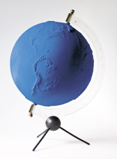 sculpture featuring a globe