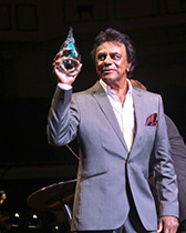 ae-views-johnny-mathis-with-award-hi-res-1col.jpg