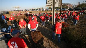 Eli Lilly and Co. has more than 8,000 workers sprucing up a six-mile stretch of I-70 between the airport and downtown.