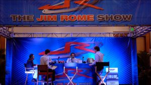 ''Radio Row'' at the JW Marriott is the temporary home of over 100 radio stations and their personalities, including big names like Jim Rome.