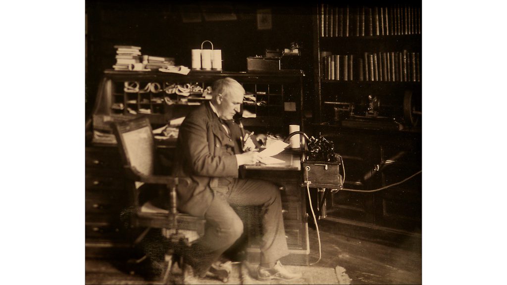 Edison dictates on one of his business phonographs.
